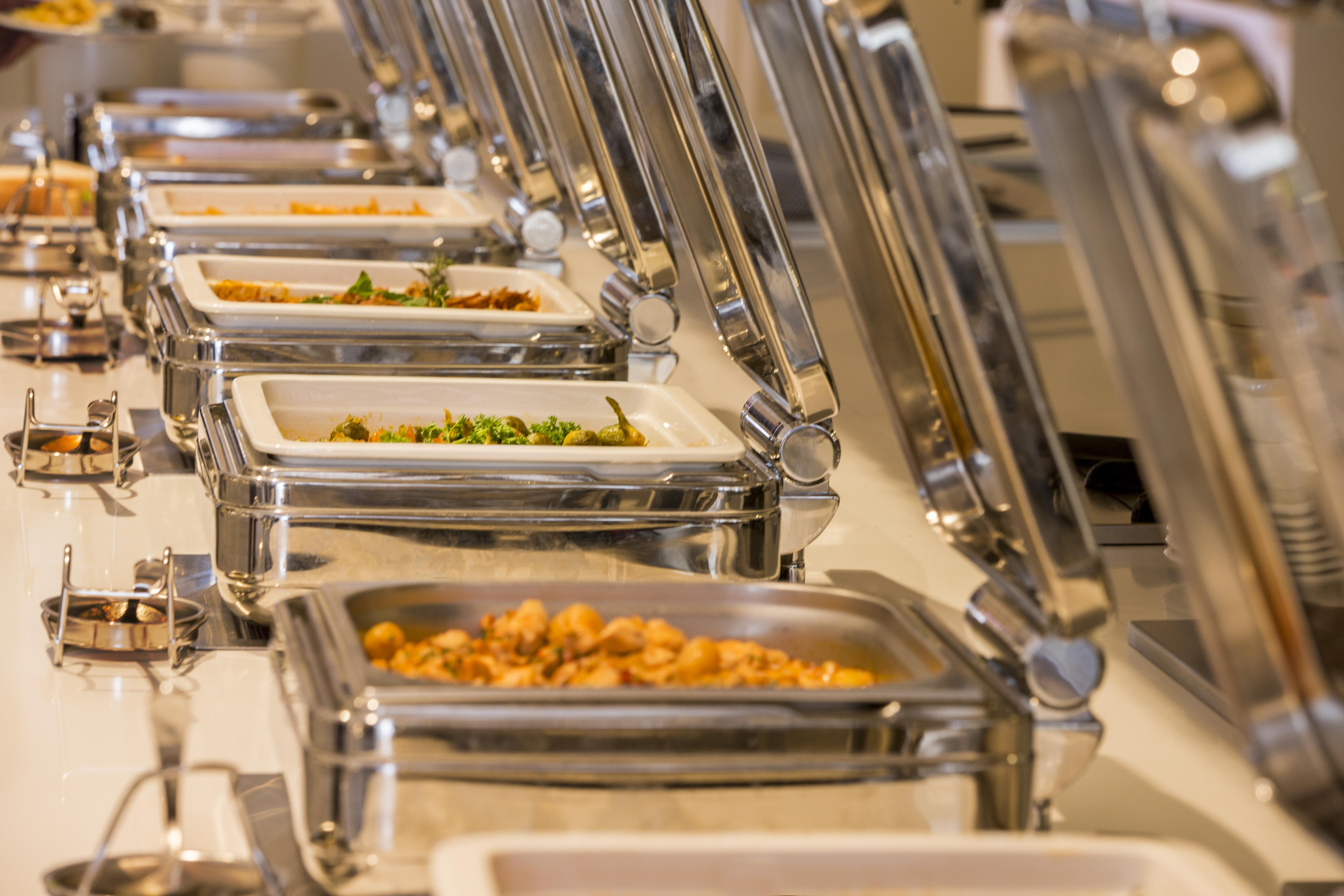 Innvista Hotels Belek Buitenkant foto A row of chafing dishes